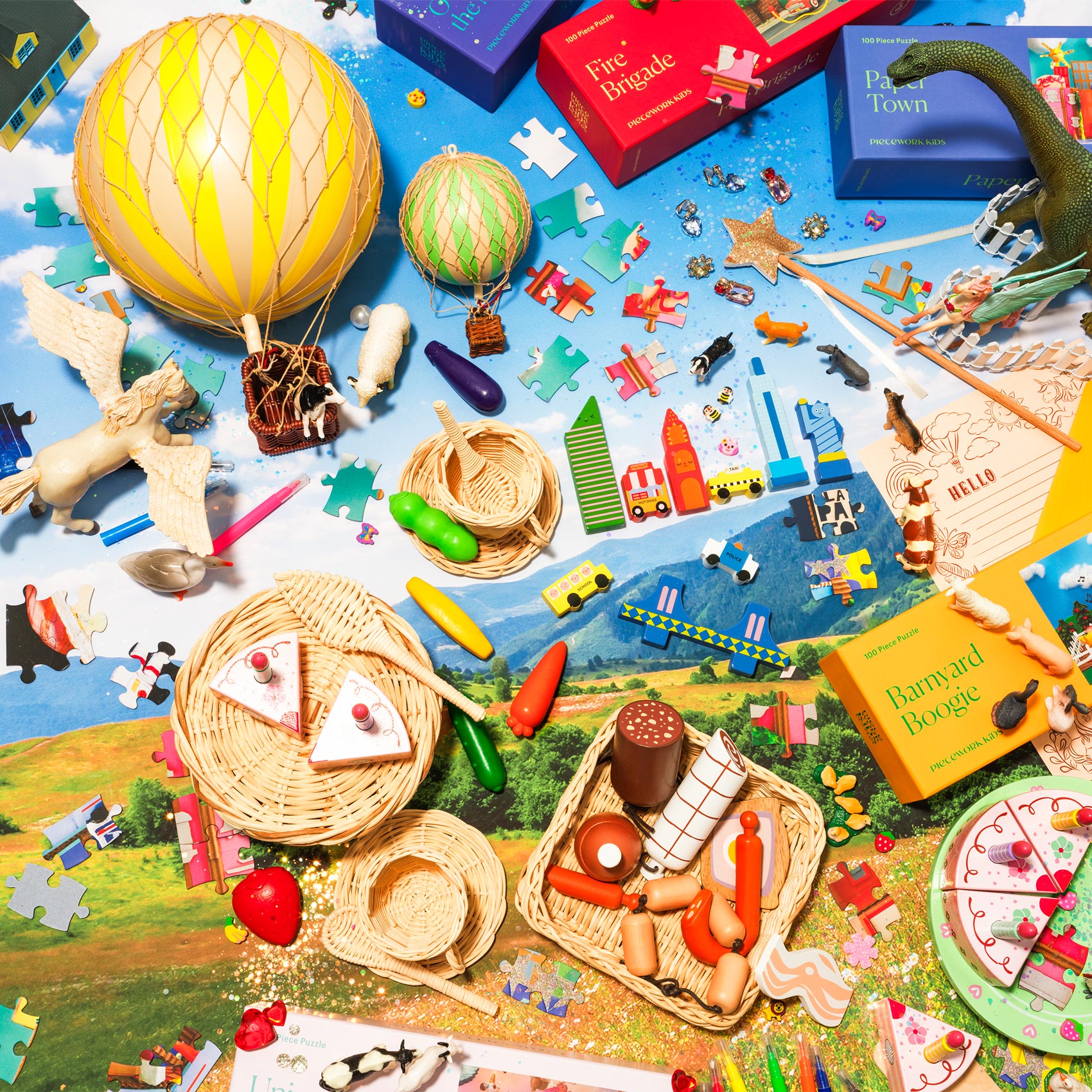 A curated collection of creative gifts for kids, featuring Piecework puzzles, and more whimsical items—miniature hot air balloons, the cutest wooden toys and birthday gifts—perfect for sparking imagination and joyful playtime.